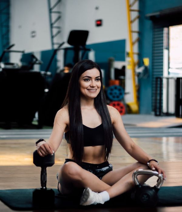 Woman feeling energetic and vibrant after a cardio session.